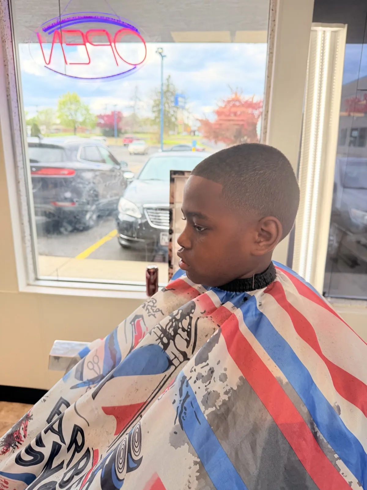 Kid's skin fade with sharp line-up
